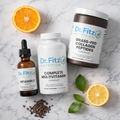 The Collagen Maximizer Bundle - Chocolate by Dr. Fitz Nutrition featuring grass-fed collagen peptides powder, complete multivitamin, and vitamin C facial serum arranged on white marble surface